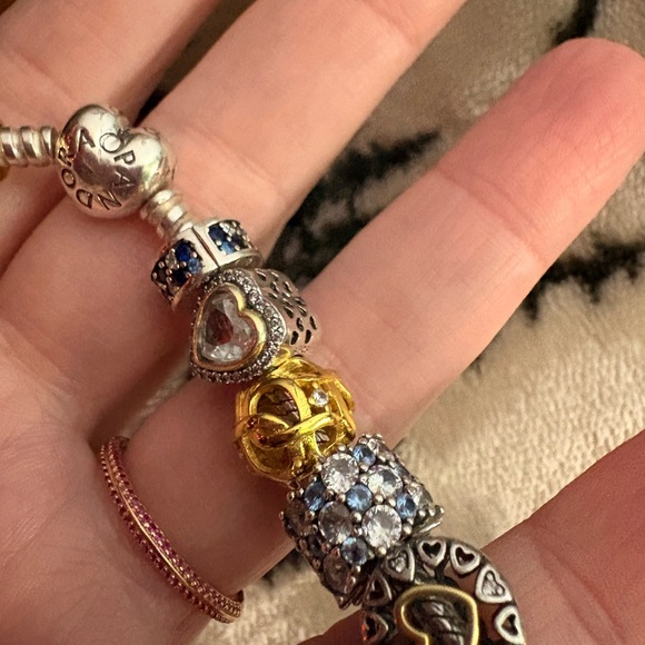 Pandora bracelet with silver, gold, blue charms - Picture 5 of 6
